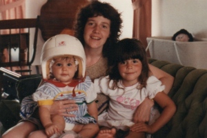 A helmet and a bonnet-- only my sister could pull off such a bold fashion/safety statement